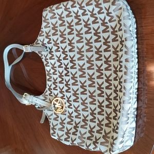 Michael Kors tote/purse with adjustable straps. Great condition.